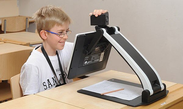A student using a on screen magnifier to access the computer. 